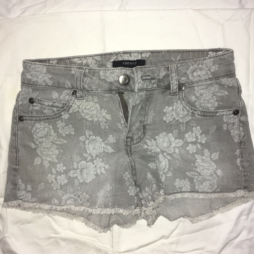 Grey denim shorts with floral print